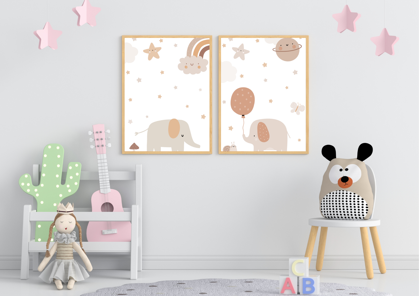 Children's room with wall art, toys, and a set of two elephant nursery prints on a light gray wall.