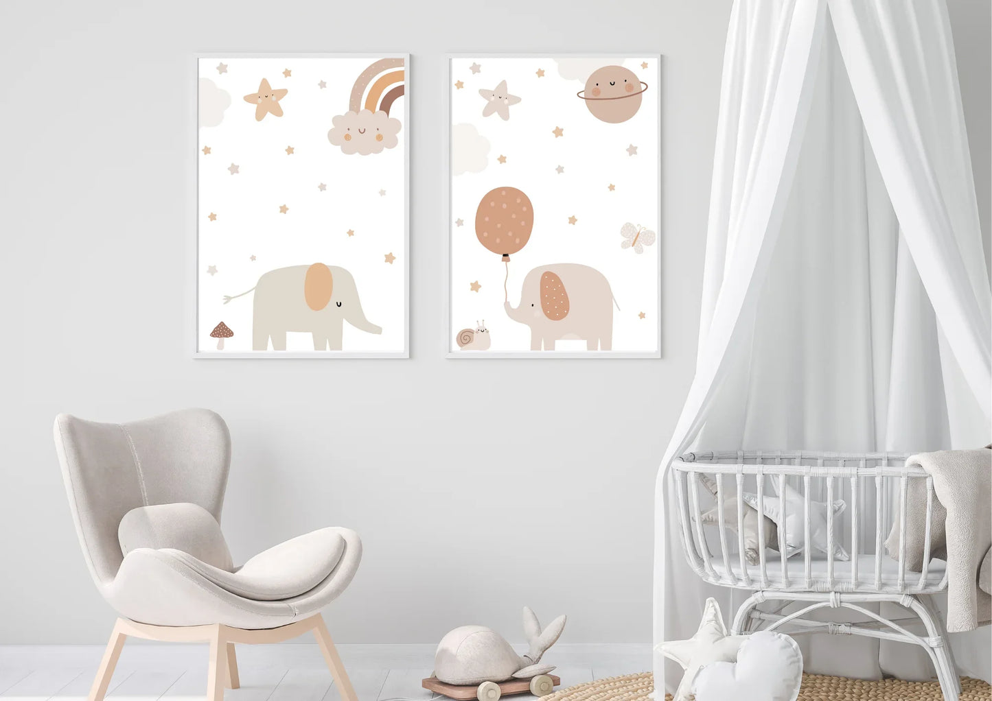 Two framed illustrations of elephants with balloons and stars on a wall in a nursery.