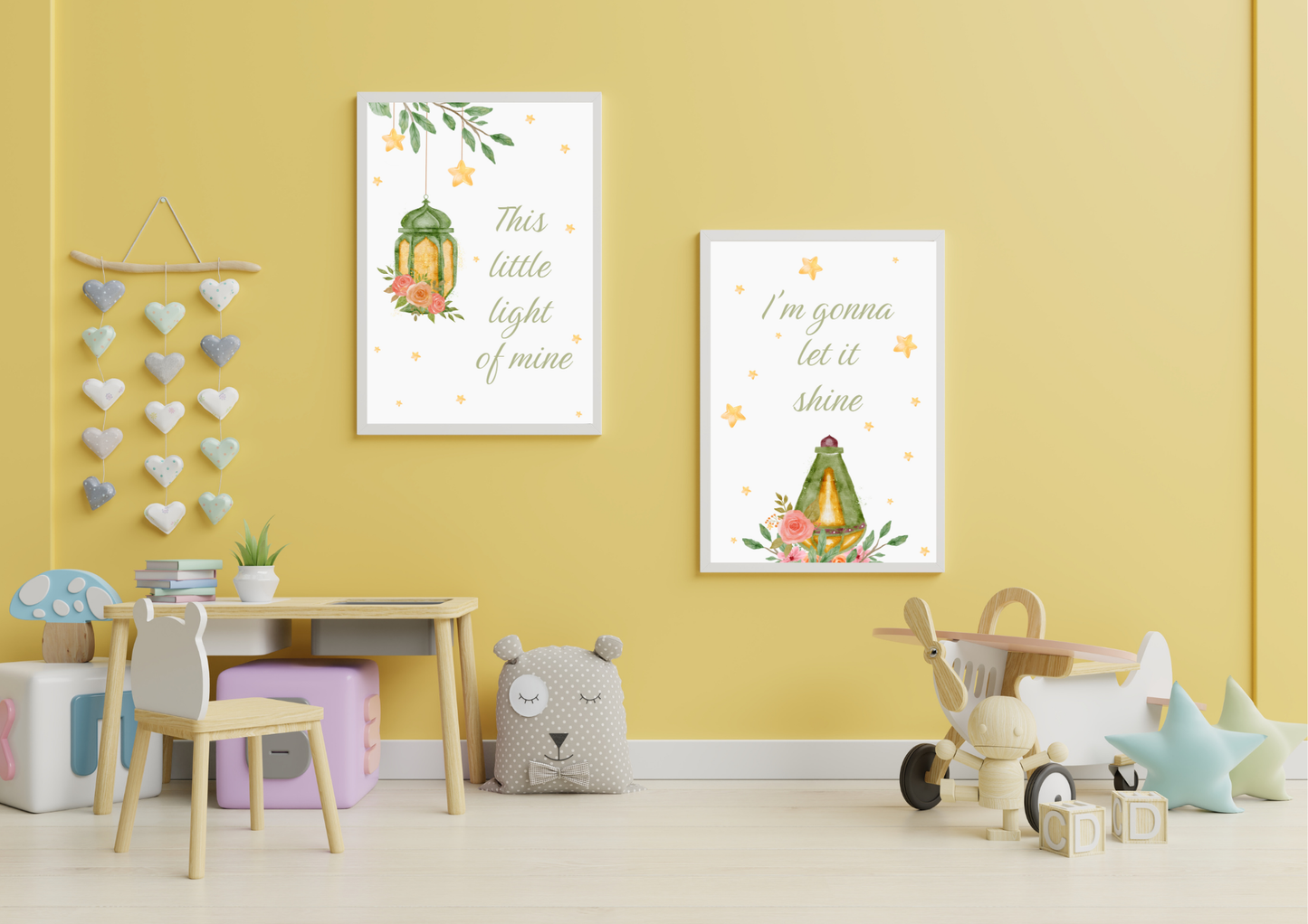 Children's room with yellow walls, toys, and two Christian framed prints.