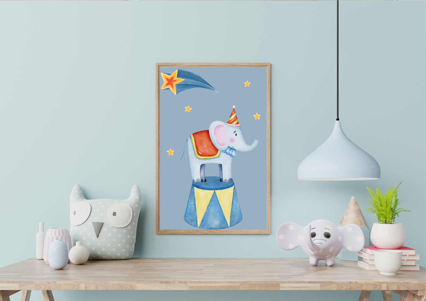 Children's room with a framed illustration of an elephant on a blue background, placed above a wooden shelf.