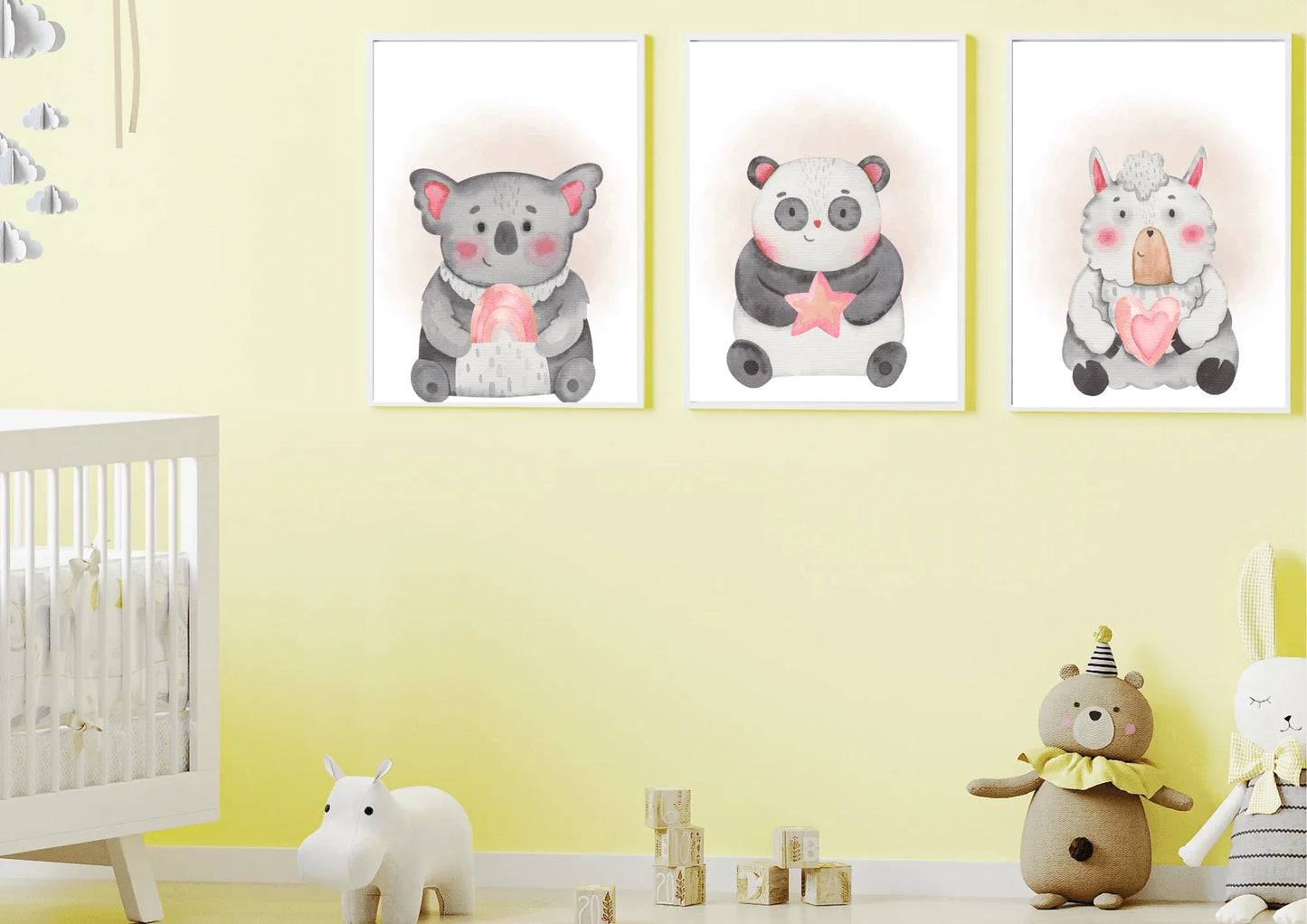 pink and grey nursery prints, featuring a panda, sheep and a koala