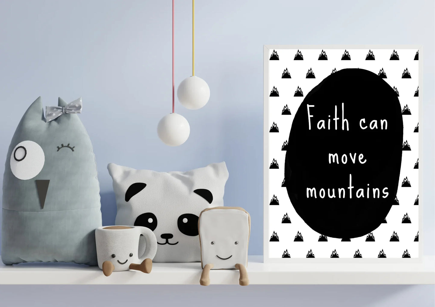 Decorative pillows, mug, and small plush toy with a religious motivational nursery poster on a light blue wall.