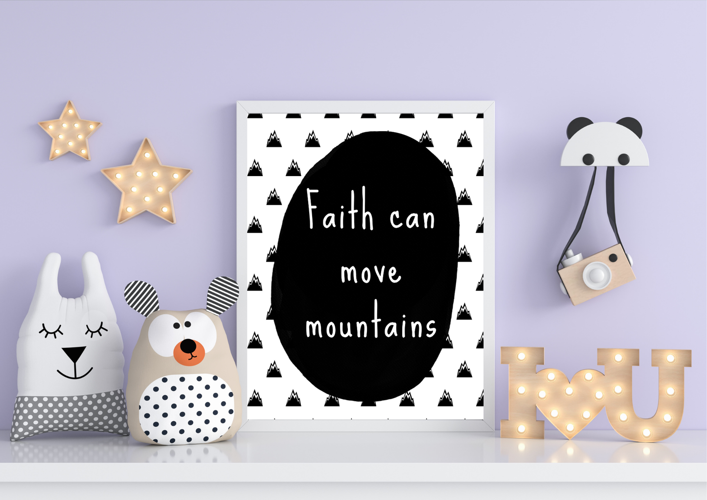 Decorative wall art with 'Faith can move mountains' quote, surrounded by cute animal-themed decor on a light purple wall.