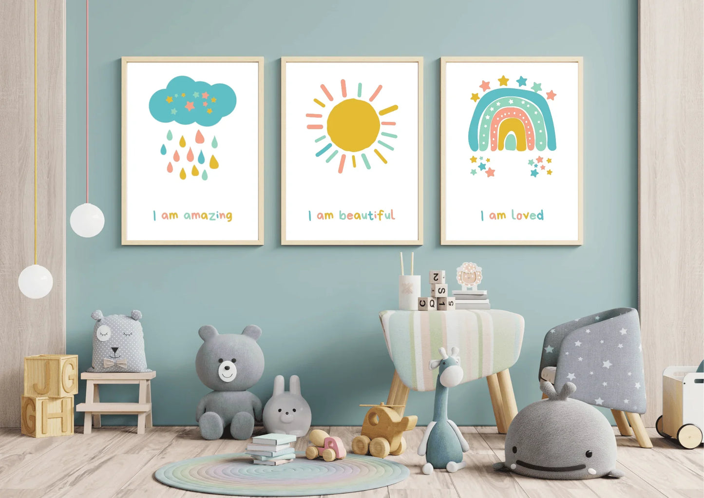 set of three nursery prints, featuring a cloud, rainbow, and a sun with positive affirmations