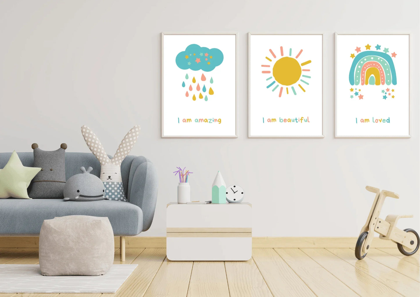 set of three nursery prints, featuring a cloud, rainbow, and a sun with positive affirmations