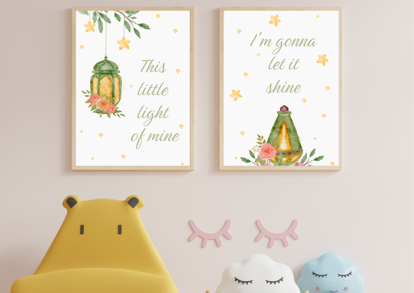 Two Christian framed prints with motivational quotes and illustrations of a lantern and flowers, displayed on a wall with decorative items below.