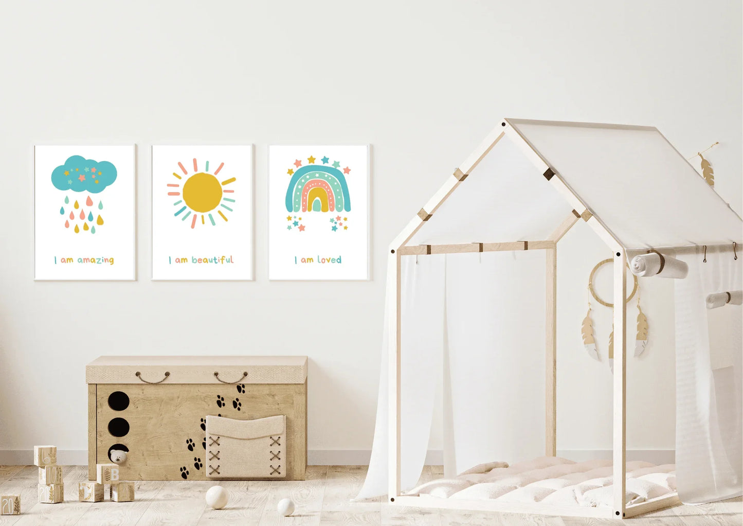 set of three nursery prints, featuring a cloud, rainbow, and a sun with positive affirmations
