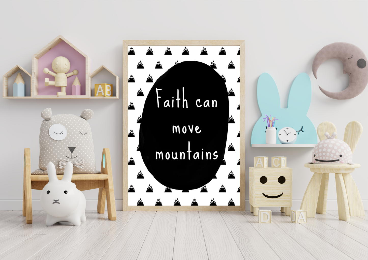 Poster with 'Faith can move mountains' quote in a child's room with toys and decor.