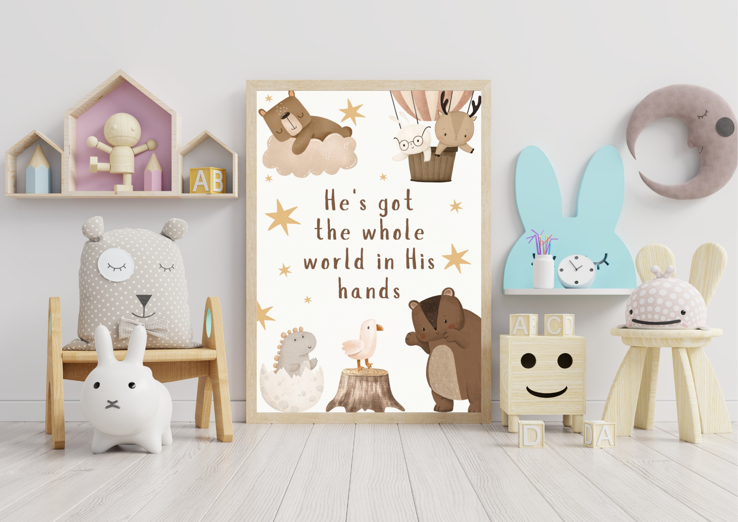 Children's room with a Christian themed nursery poster of animals and text, surrounded by toys and furniture.
