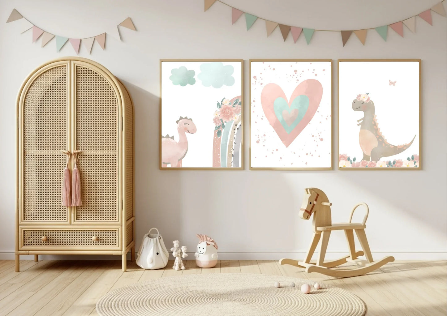A rattan wardrobe | Three prints on a wall featuring a pink dinosaur, a rainbow, a large heart, and a dinosaur with a flower crown.