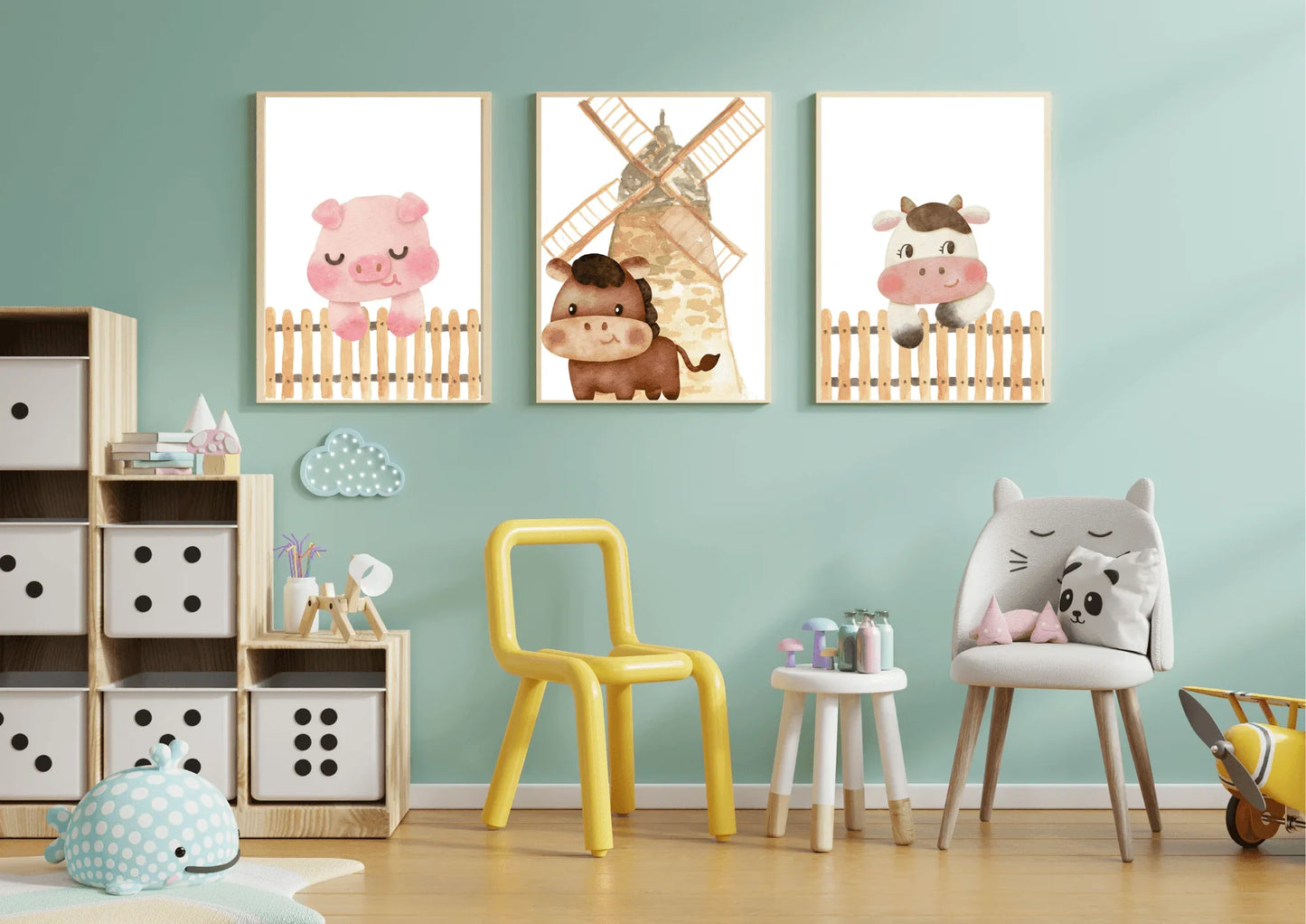 Three framed watercolor farm animal prints (pig, horse, cow) in a child's nursery with mint green walls, a wooden shelf, and small chairs.