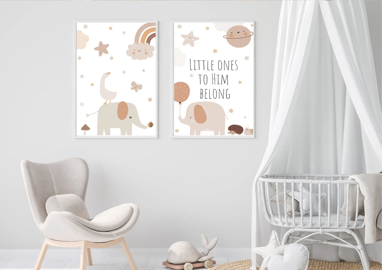 A set of two framed art prints with elephants and the quote "Little ones to him belong" on a white wall in a minimalist nursery.