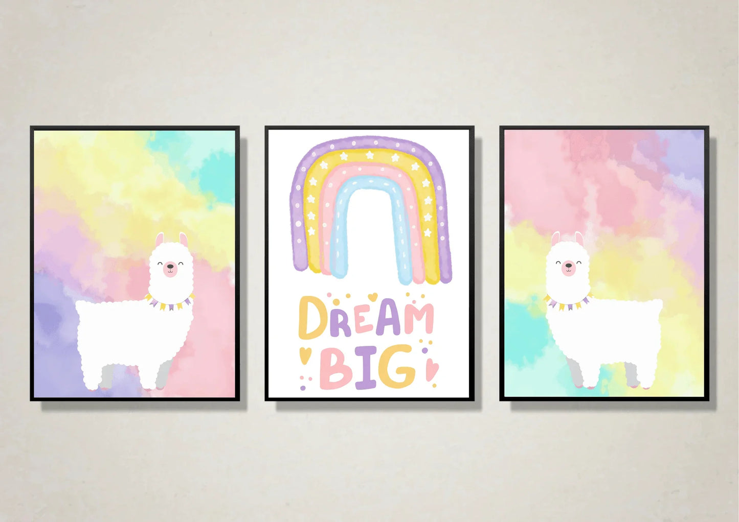 A set of three whimsical llama and rainbow art prints in black frames.