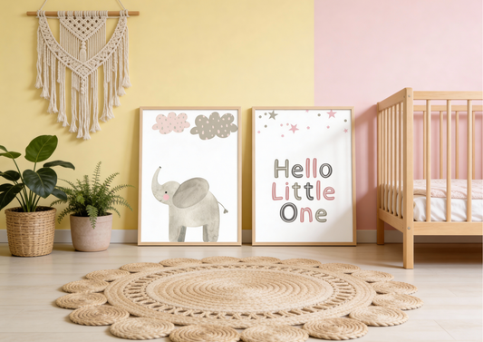 Nursery room with a crib, framed pictures of an elephant and 'Hello Little One', and decorative elements.
