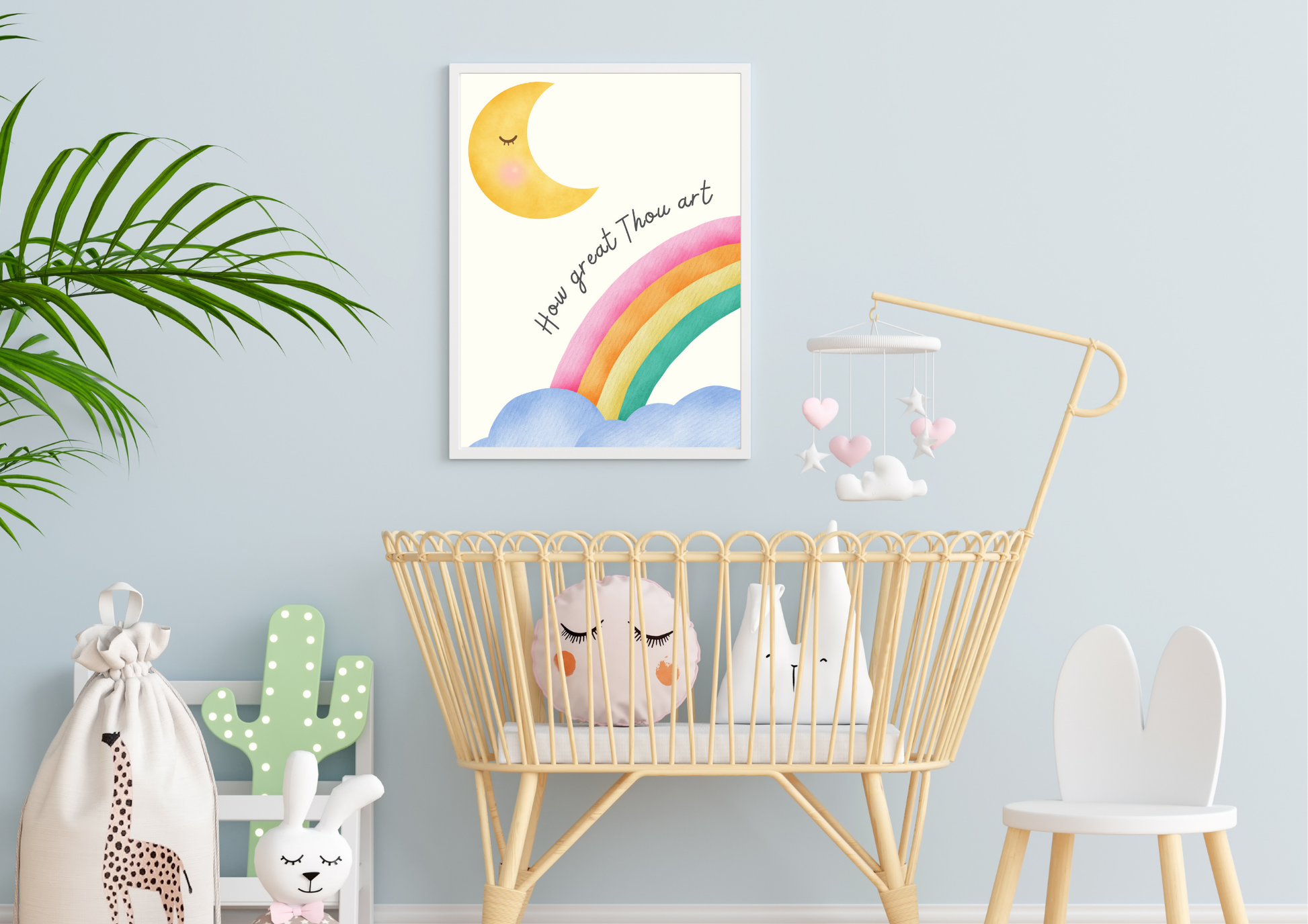 Nursery room with a crib, decorative items, and a religious wall art print with a rainbow and moon.