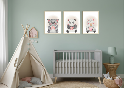 Nursery room with a crib, teepee, and wall art of animals.