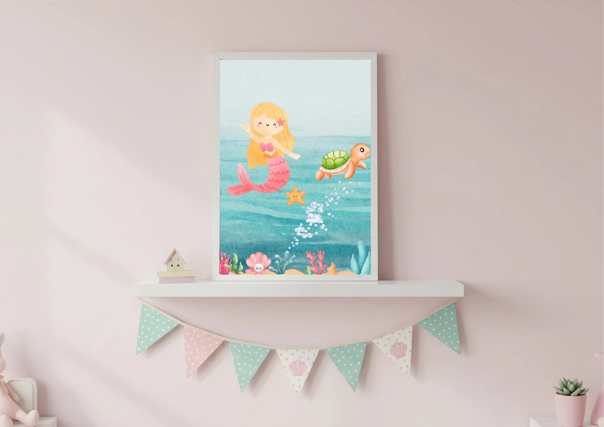 Framed artwork of a mermaid and turtle on a shelf with decorative flags in a room.
