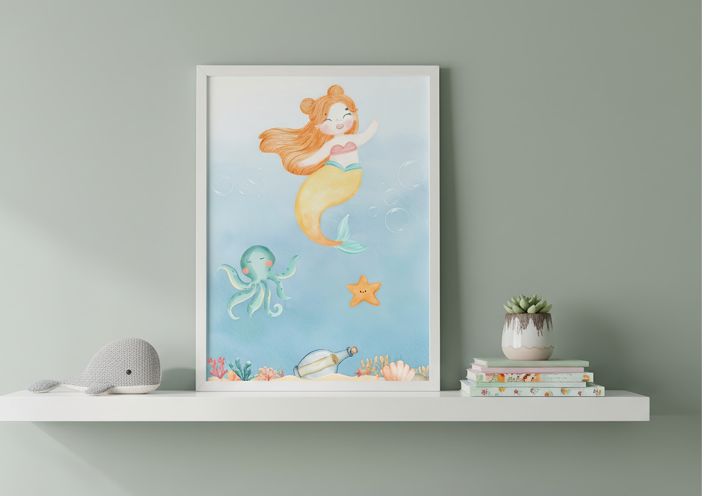 Framed illustration of a mermaid with an octopus and starfish on a shelf against a light green wall.