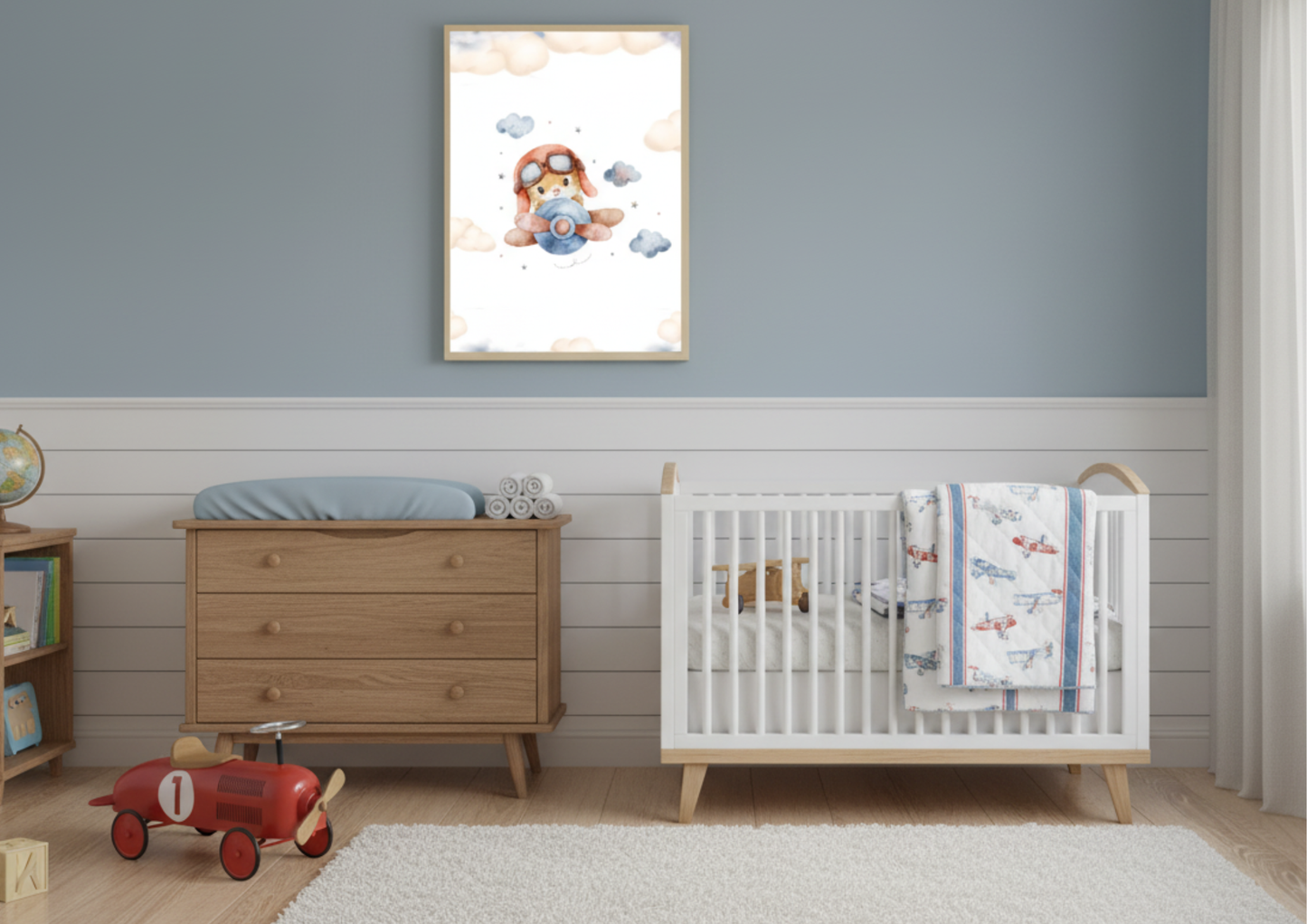 Watercolor squirrel pilot airplane print framed in a modern, neutral, adventure-themed nursery above a wooden crib.