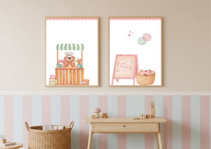 Two framed sweet themed nursery  illustrations on a wall with a striped wallpaper background