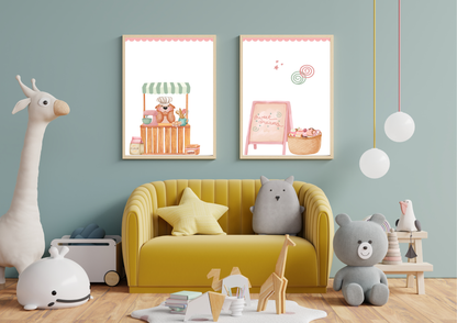 Children's room with yellow sofa, toys, and sweet bakery themed nursery wall art on a light blue wall.