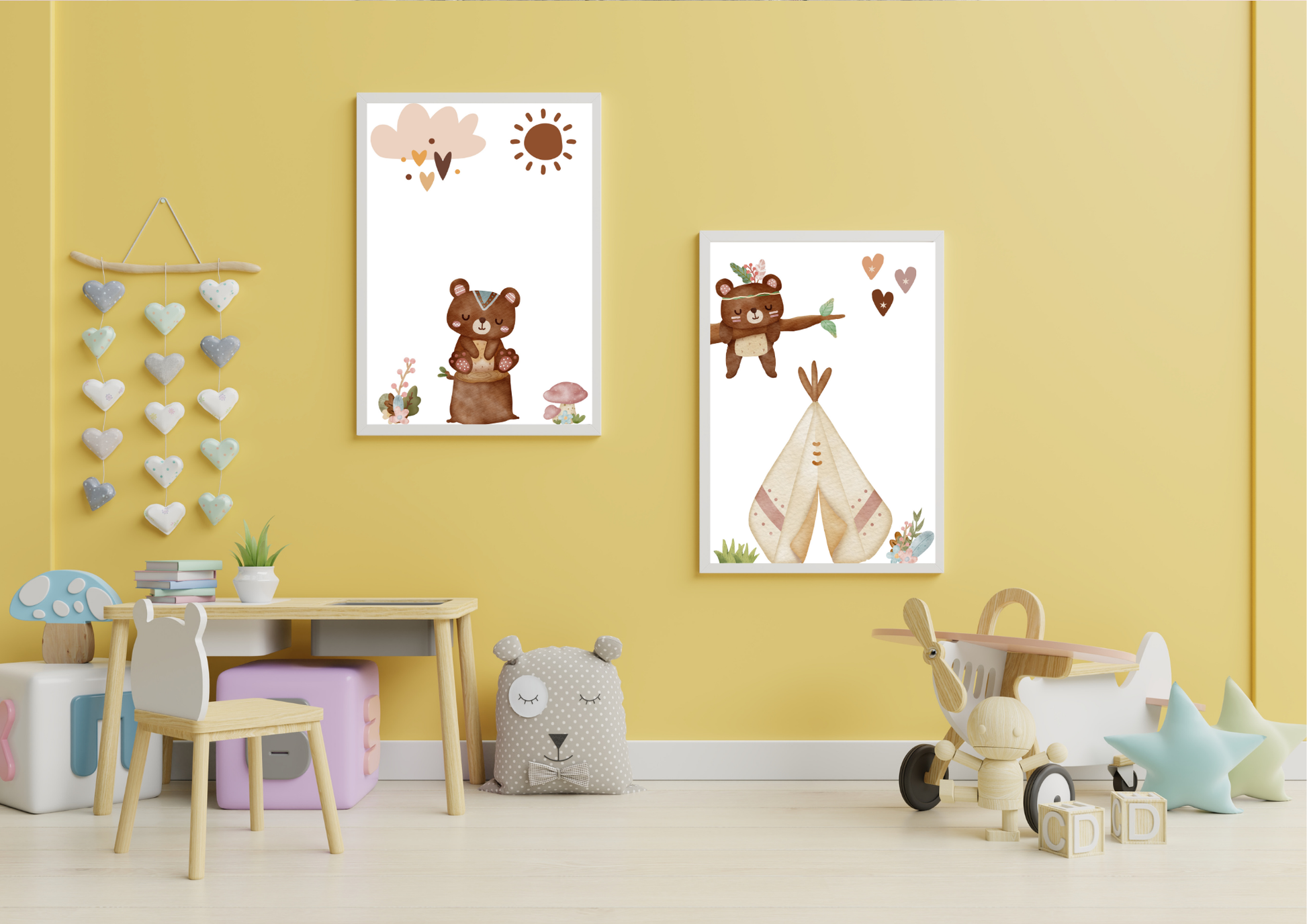 A bright playroom with cheerful yellow walls and children's furniture. Two framed Aztec tribal bear prints hang on the wall above a small wooden table, a stuffed animal pillow, and a wooden toy airplane on the floor.