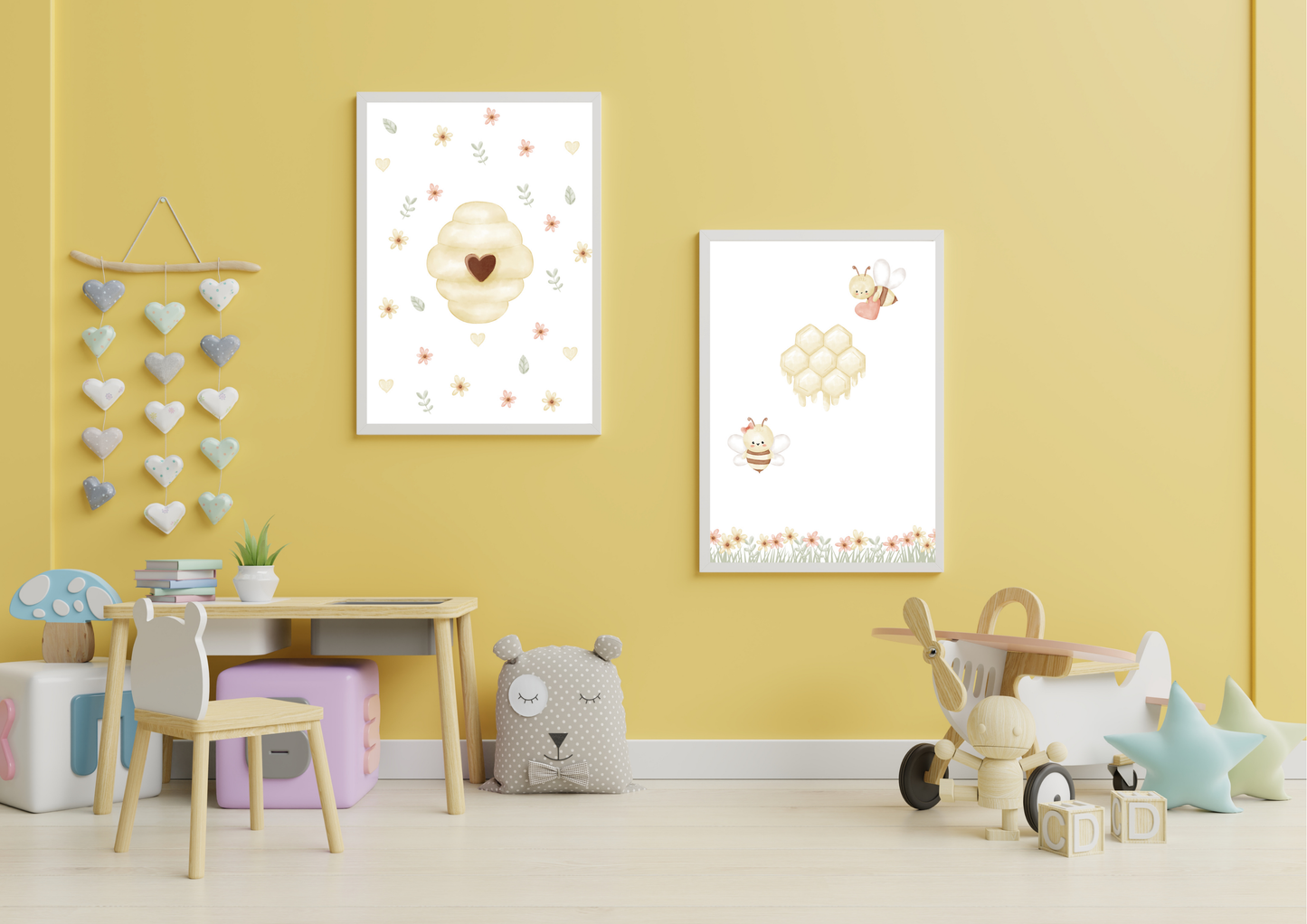 Children's room with yellow walls, framed artwork, and toys.