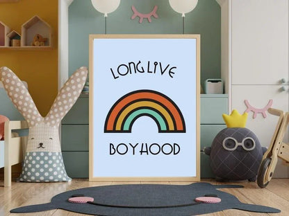 Long Live Boyhood retro rainbow print in a nursery with a plush bunny, a stuffed monster, and children's toys on a shelf.