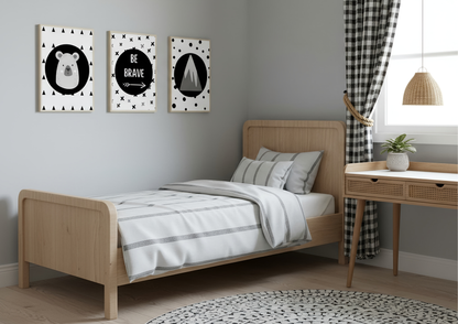 Children's bedroom with wooden bed, striped bedding, and wall art.