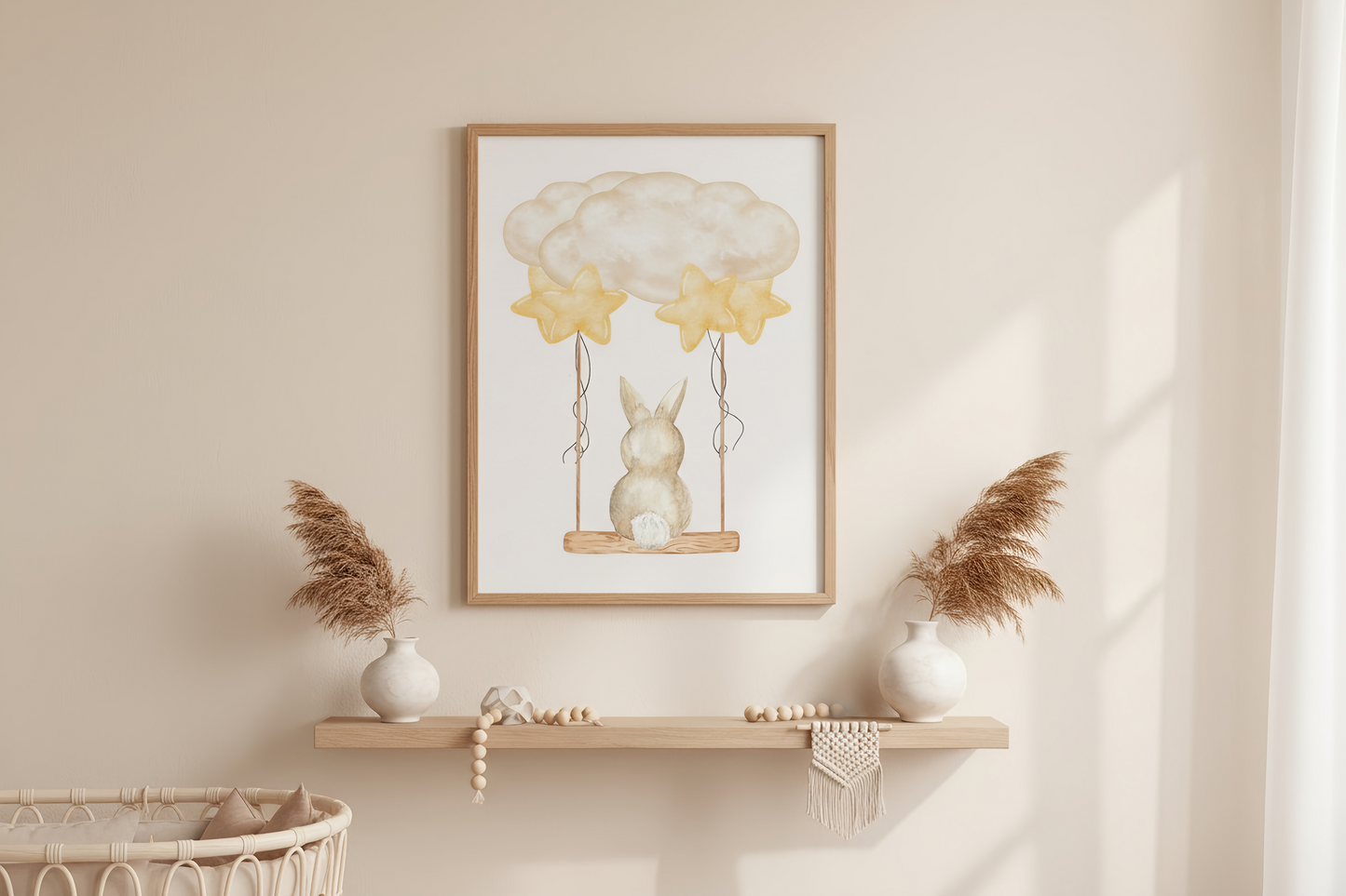 Framed artwork of a rabbit on a swing with balloons above, displayed on a wall above a shelf.
