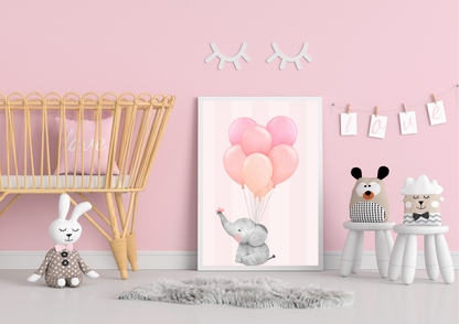 Children's room with pink walls, toys, and a framed picture of an elephant with balloons.