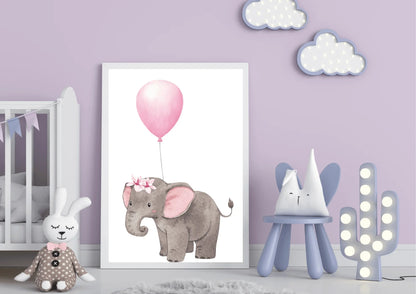 A framed nursery print of a baby elephant with a floral crown holding a pink balloon, standing on a rug in a lavender-colored room with a crib, a stuffed rabbit, and a cactus-shaped lamp.