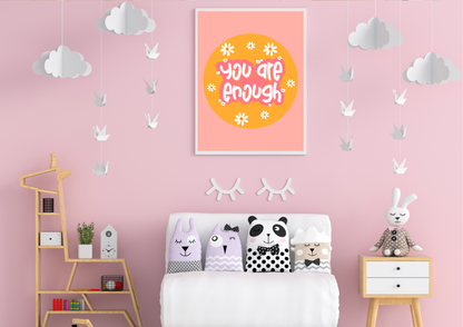 Children's bedroom with pink walls, cloud decorations, and a motivational "you are enough" poster.