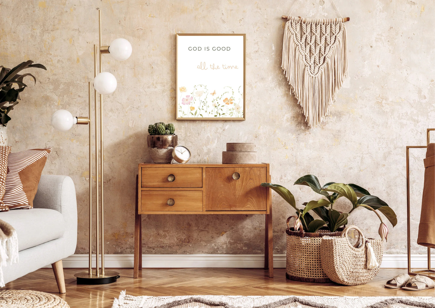 Living room with wooden console table, decorative plants, and wall art.