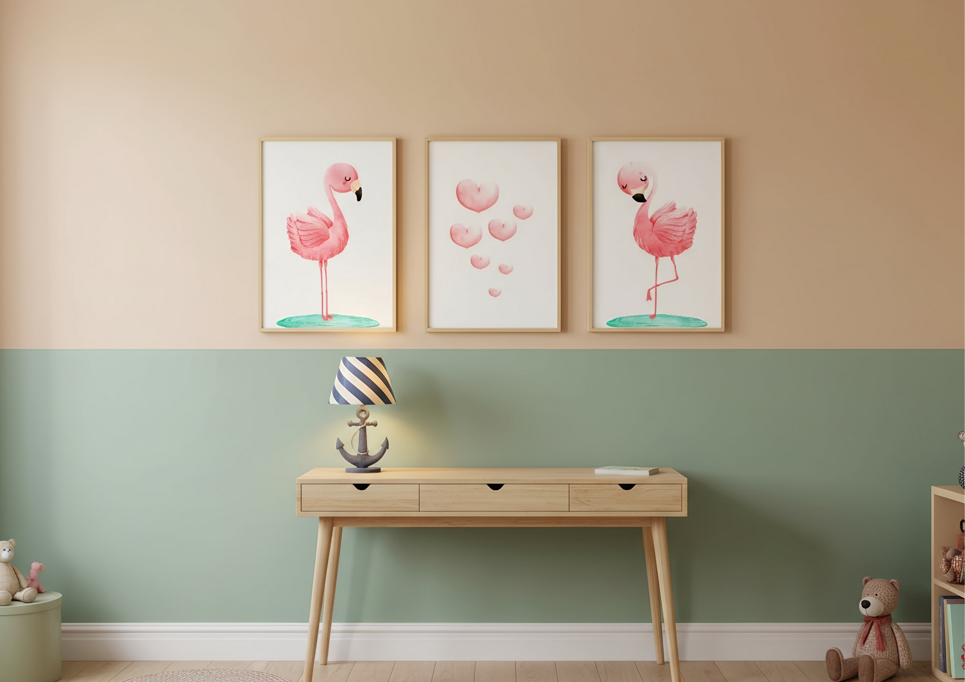 Three flamingo prints on a wall above a wooden console table with a lamp and toys.