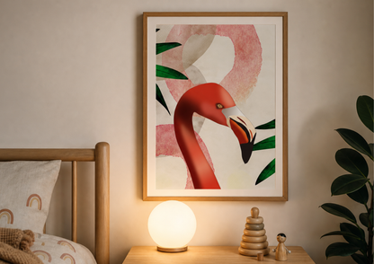 A framed art print featuring a stylized red flamingo with green leaves on a cream background, hanging on a beige wall above a wooden nightstand with a glowing lamp and small decorative objects.