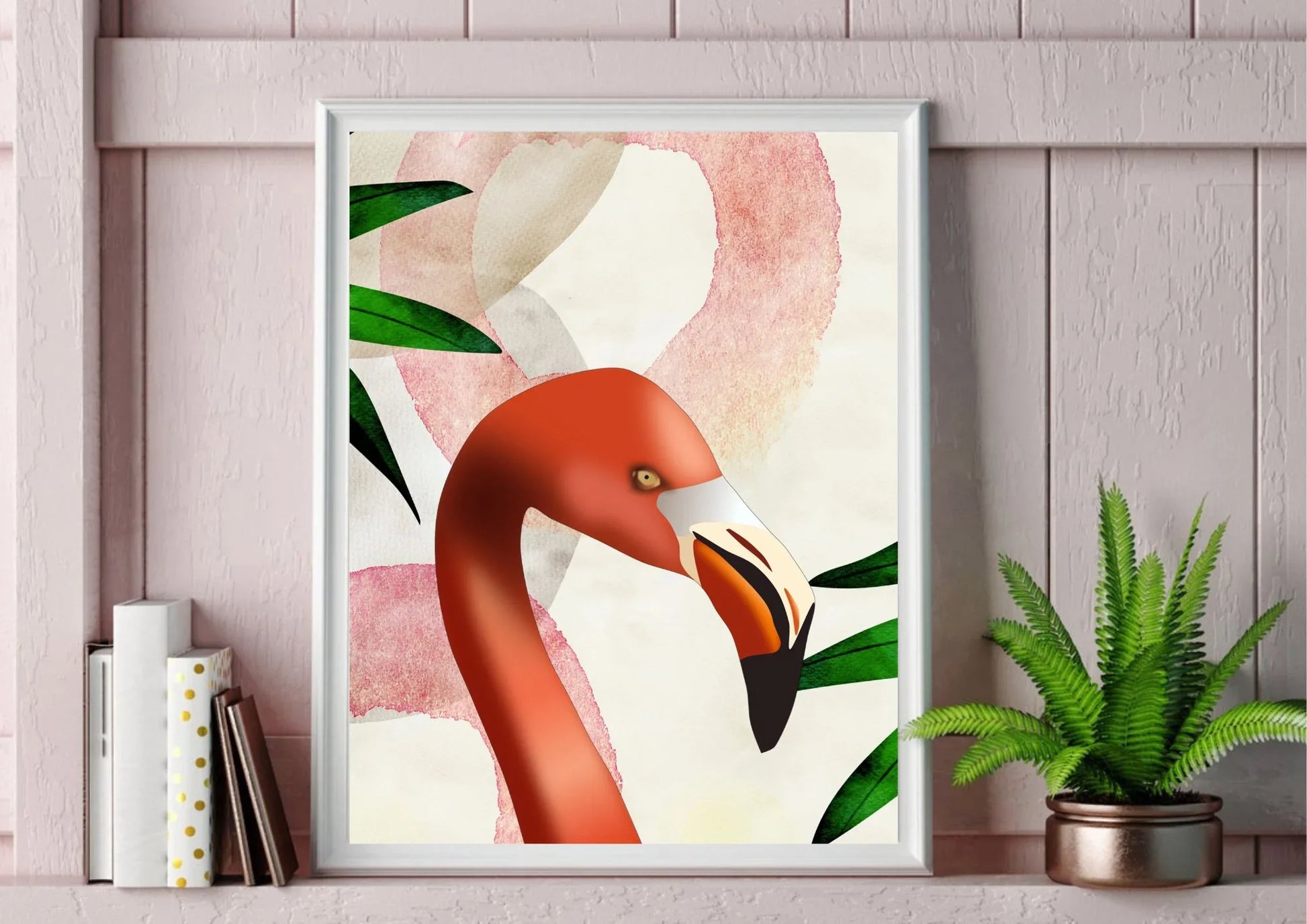 Framed artwork of a flamingo with tropical leaves on a wall.