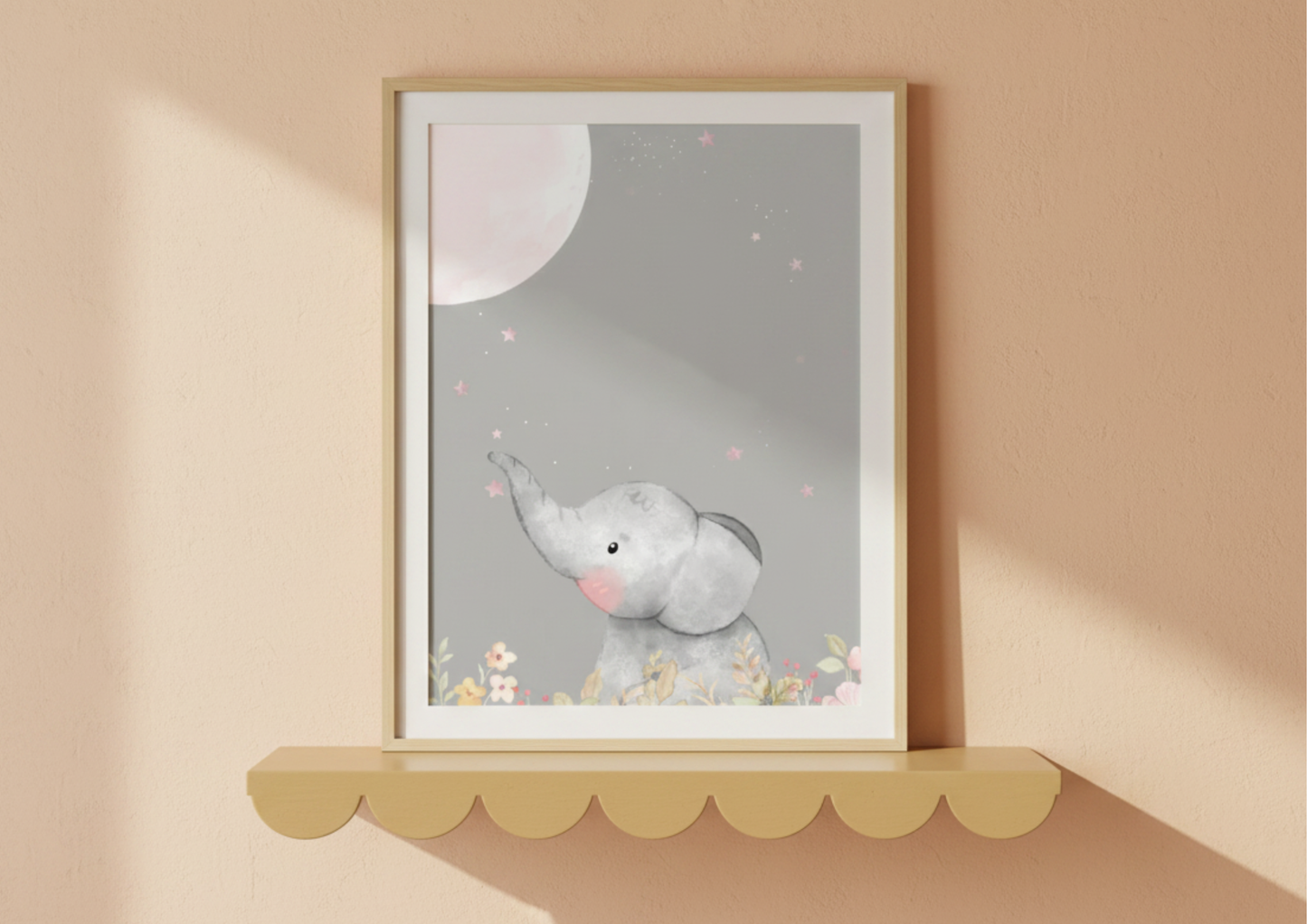 Framed artwork of a baby elephant on a scalloped shelf, on a beige wall