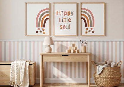 Nursery room with wooden table, toys, and wall art featuring rainbow designs and 'Happy Little Soul' text.