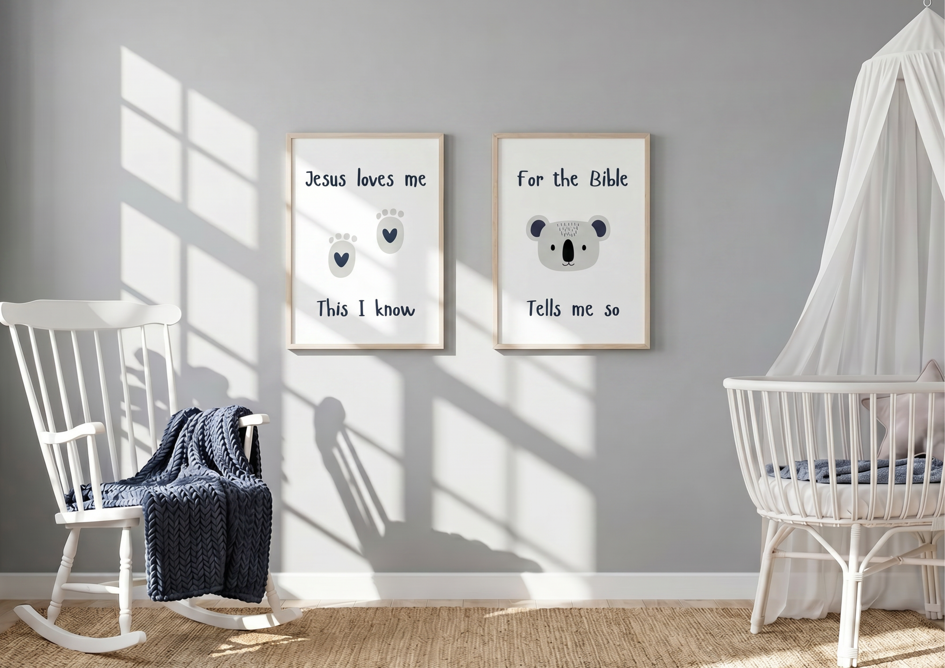 Grey nursery with "Jesus Loves Me" and koala watercolor framed wall art prints hanging above a white rocking chair and crib.
