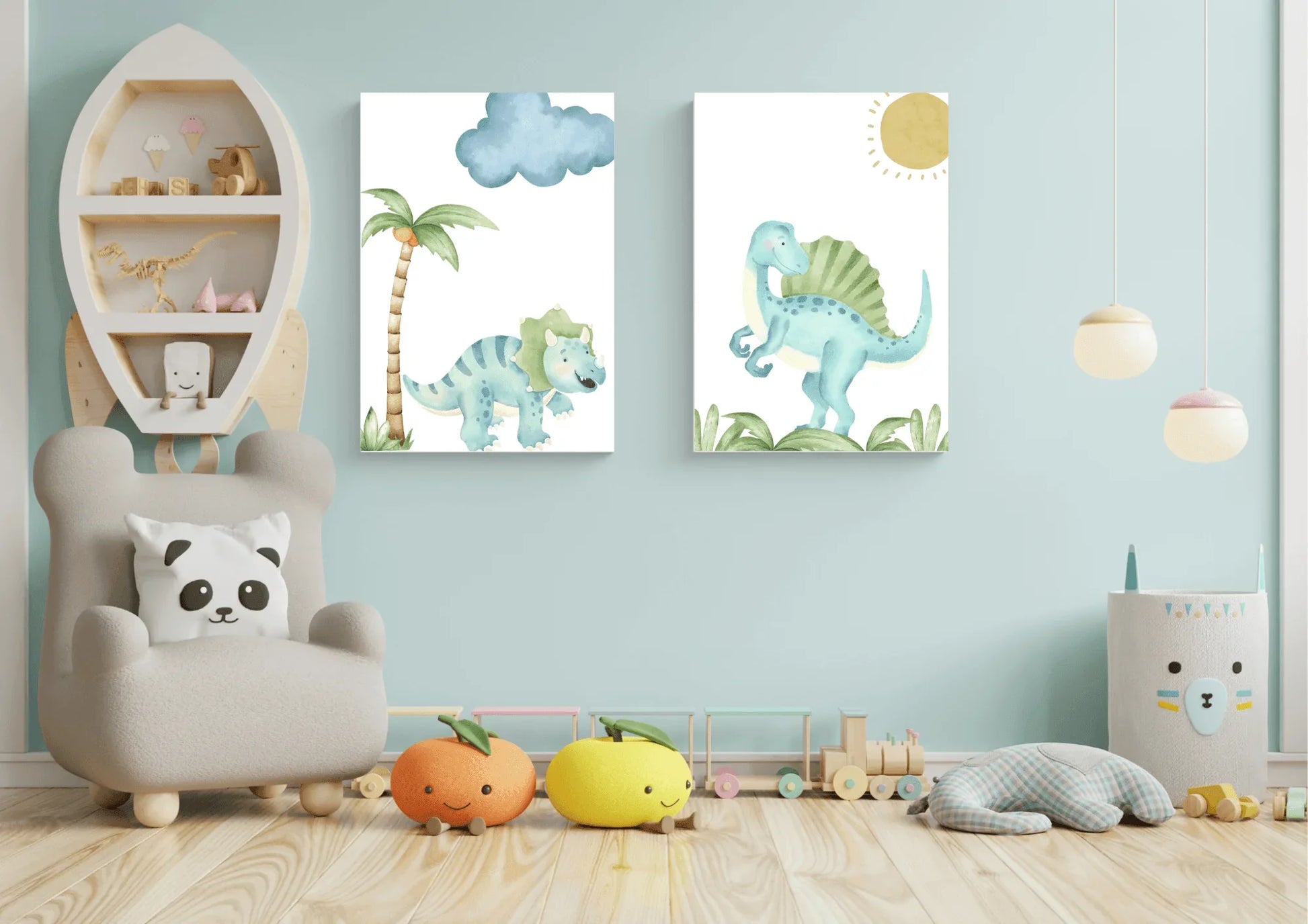 A set of two watercolor dinosaur art prints on a blue wall in a child's playroom with a rocket shelf and toys.