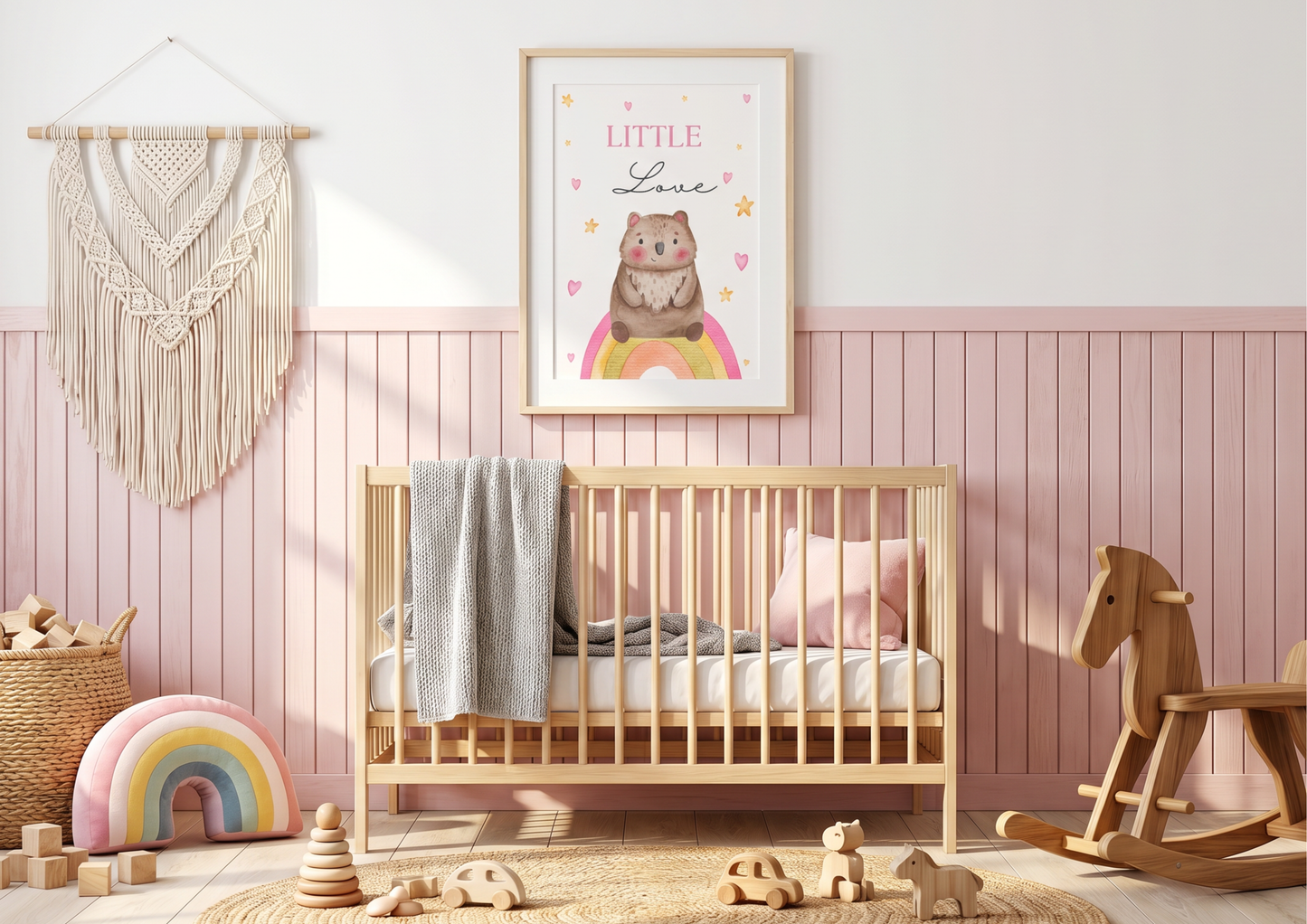 Nursery room with wooden crib, toys, and decorative elements on a pink wall.