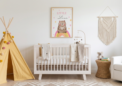 Nursery room with a crib, teepee, and wall art in a home setting.