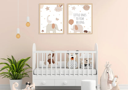 A set of two framed art prints with elephants and the quote "Little ones to him belong" on a peach wall above a white crib.