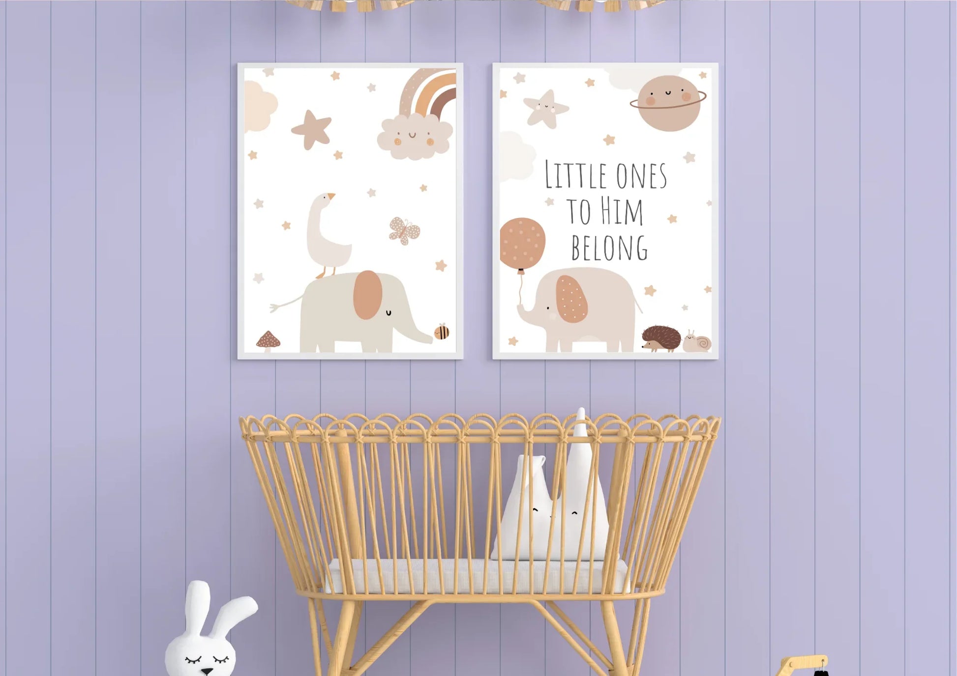 Nursery room with two wall posters featuring elephants and text, a crib, and decorative elements on a purple wooden panel wall.