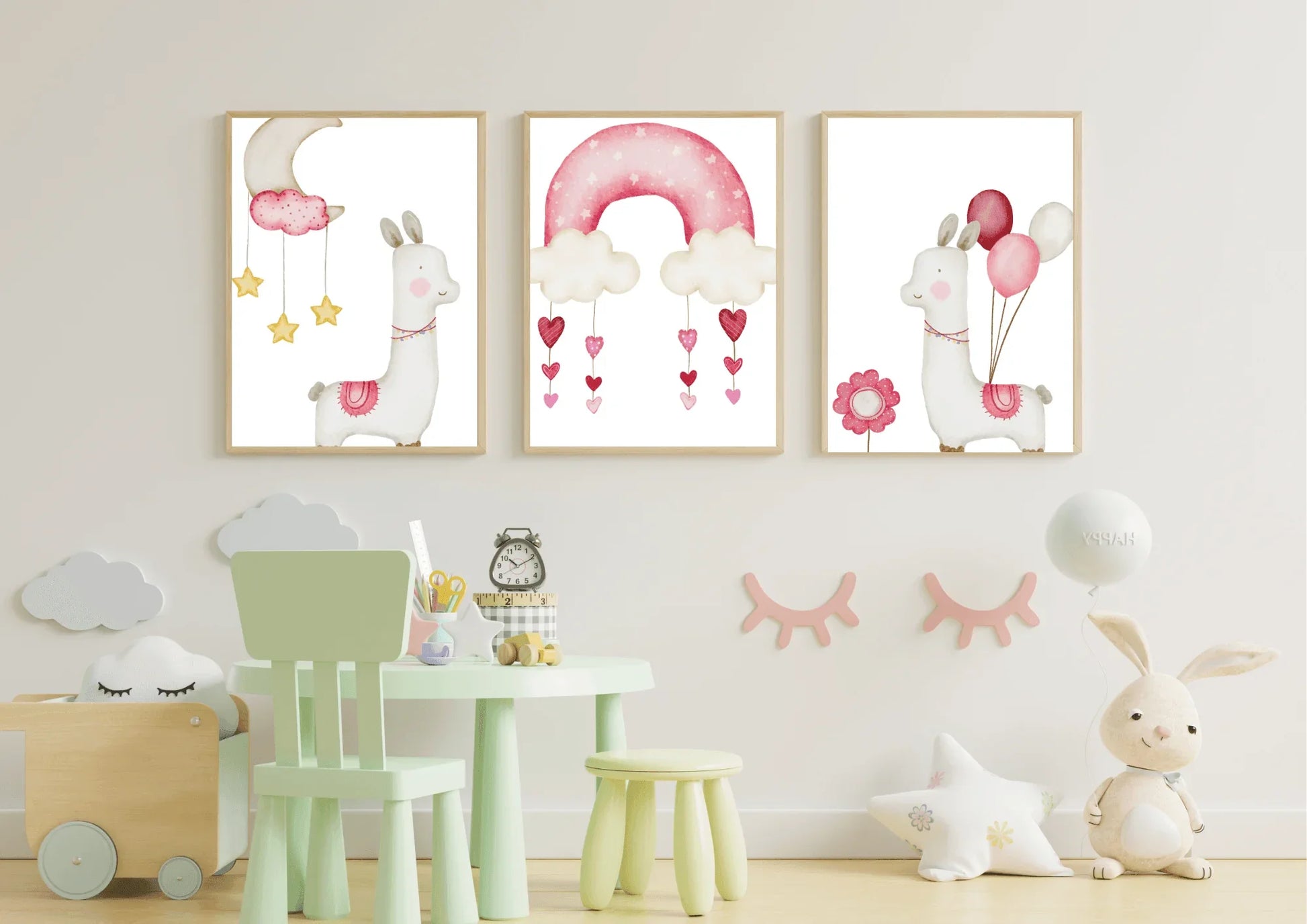 Children's room with wall art featuring llamas and balloons, green chair, and toys.