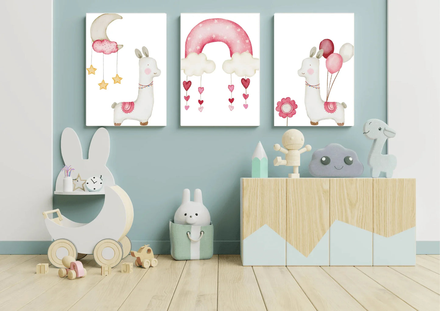Children's room with decorative wall art, toys, and furniture against a light blue wall.