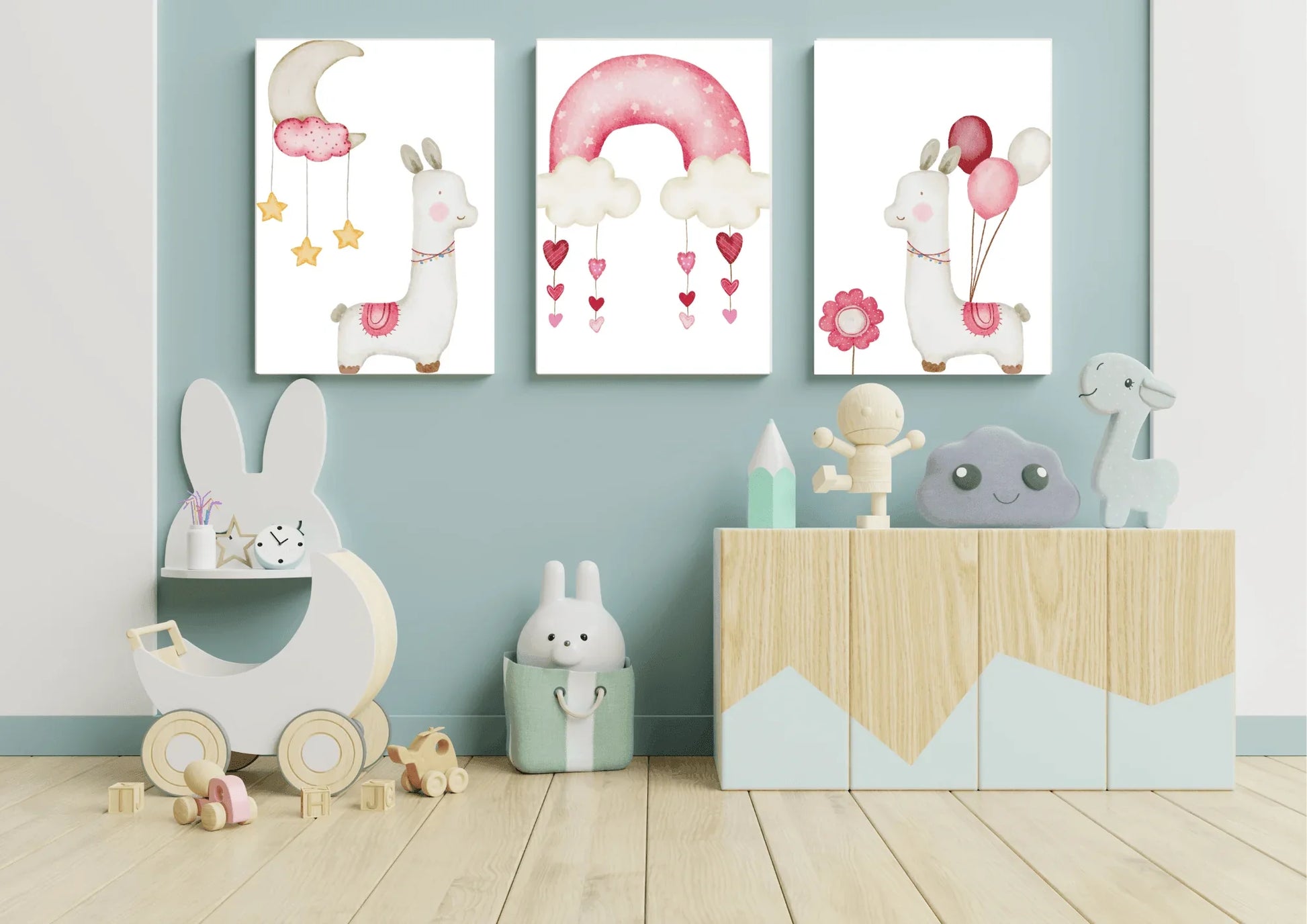 Children's room with decorative wall art, toys, and furniture against a light blue wall.