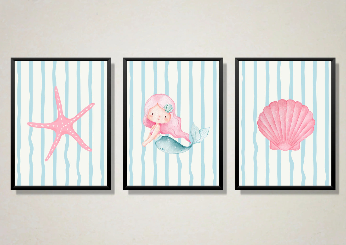 Three framed artworks featuring a mermaid, starfish, and shell on a striped background.