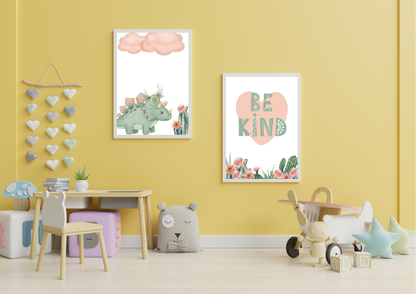 Mint Pink Dino Nursery Wall Art prints featuring a dinosaur and a "Be Kind" quote, displayed in a child's playroom with a bright yellow wall.
